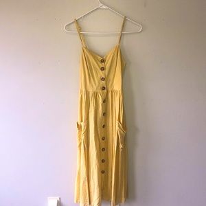 Yellow midi dress with buttons